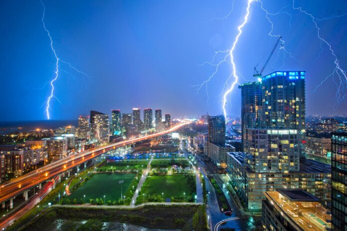 Cityscape with lightning at night.