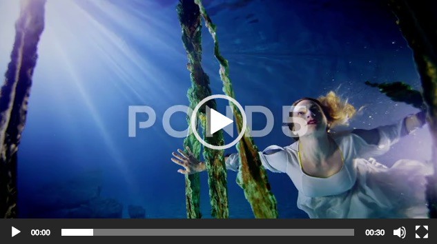 Beautiful Mysterious Underwater Woman In White Dress