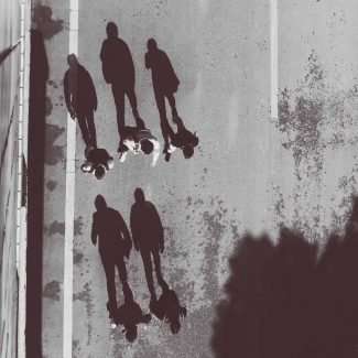 Forced perspective photography of shadows on the road