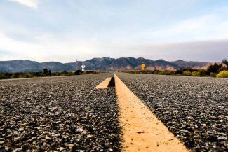 Forced perspective photography of a never-ending road