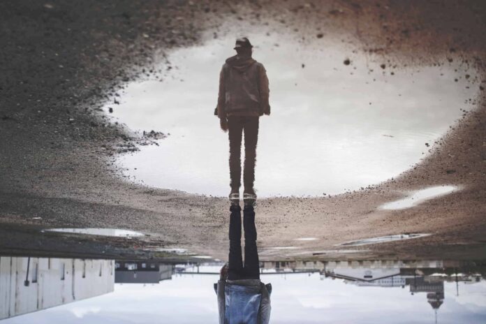 Rflection - a way to create a forced perspective | Image by Randy Jacob Rflection - a way to create a forced perspective | Image by Randy Jacob