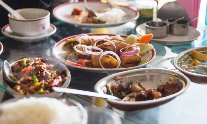 Tibetan food style: salad and more served in the a restaurant at Gangtok. Sikkim, India.