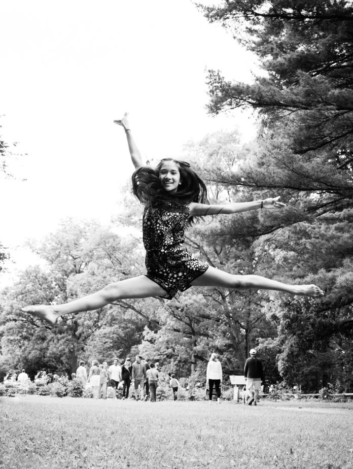 black and white girl jumping