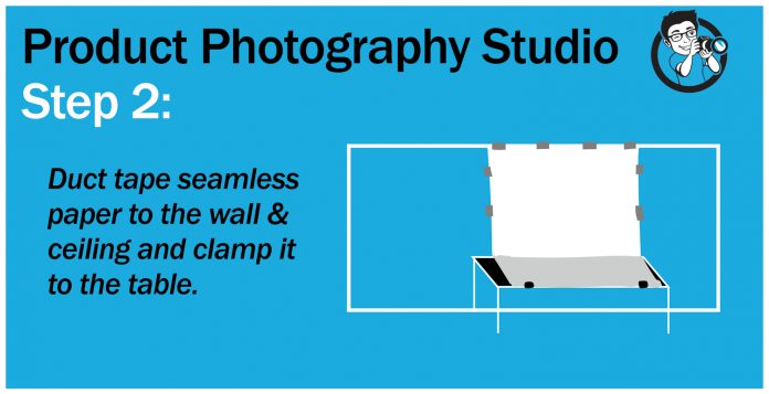 Step 2 - duct tape seamless paper and clamp to table diy photo studio