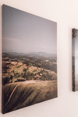 Canvas print of expansive landscape hanging on wall