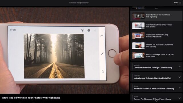 The iPhone Editing Academy course showing a still with hands holding an iPhone displaying a landscape photo.