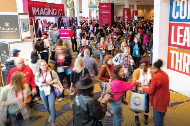 Imaging USA attendees walking through the conference hallway.