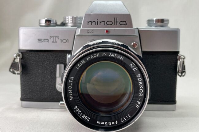 Minolta SRT 101 35MM SLR Film Camera with Lens Attached